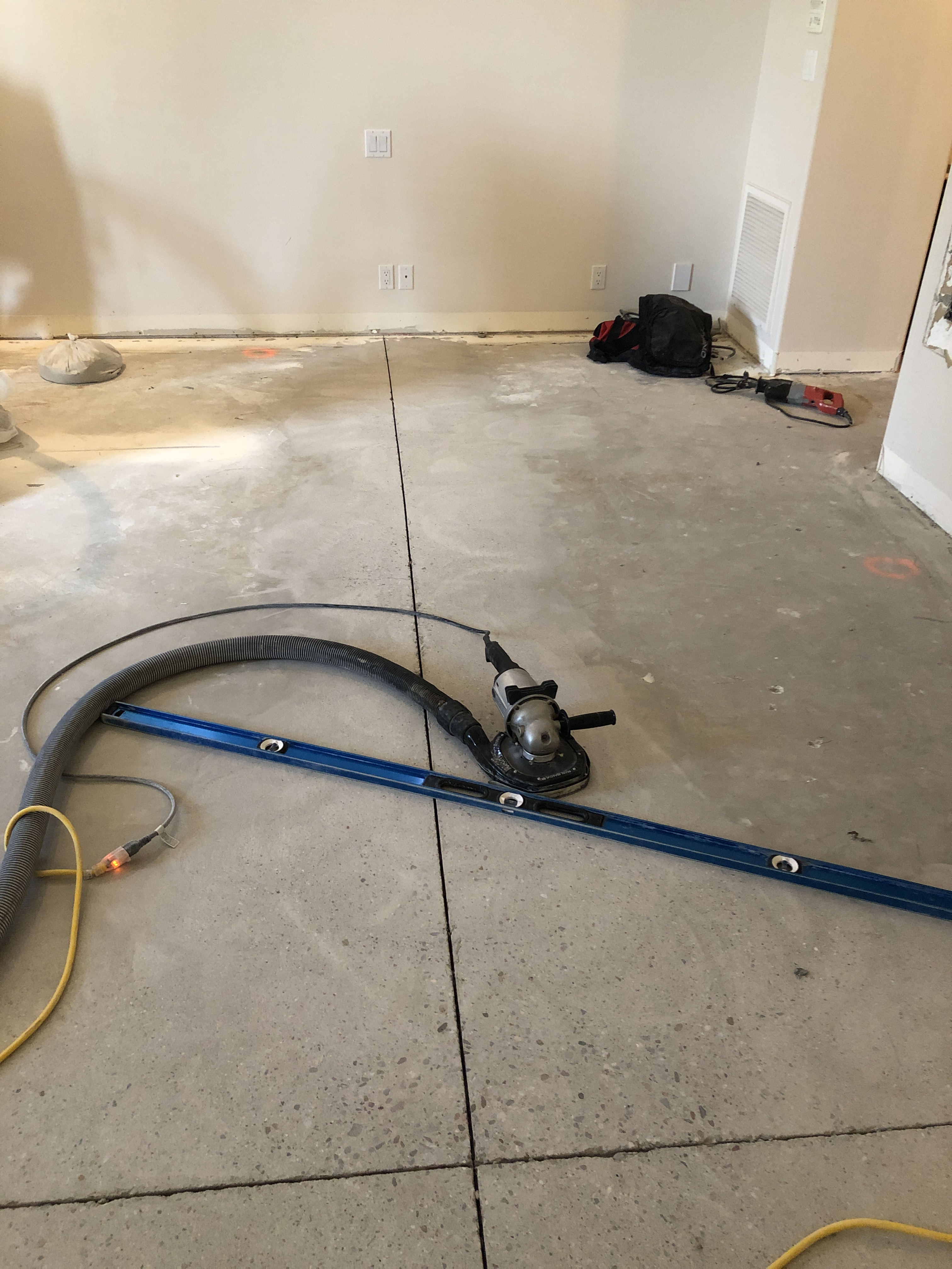 Grinding down expansion joint for new tile install