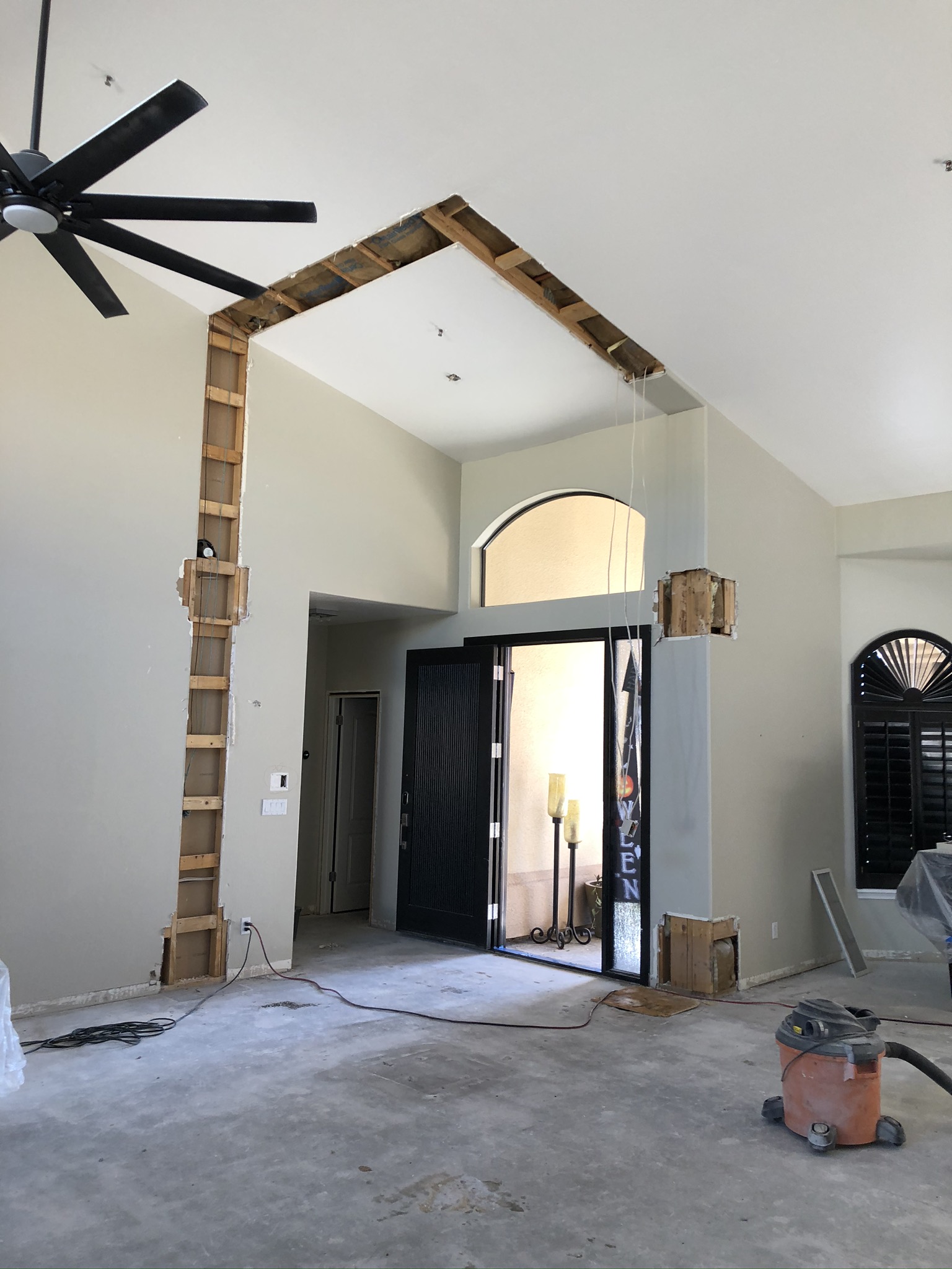 After demo, space is much more open showing off those tall ceilings.