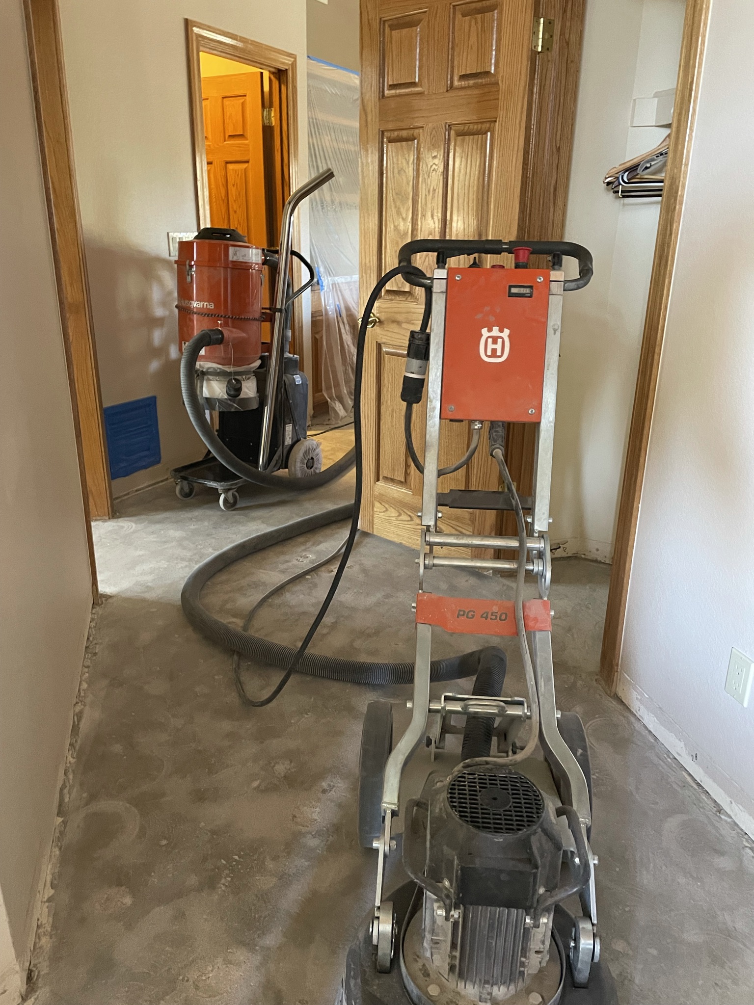 Grinding thinset using husqvarna grinder and vac.