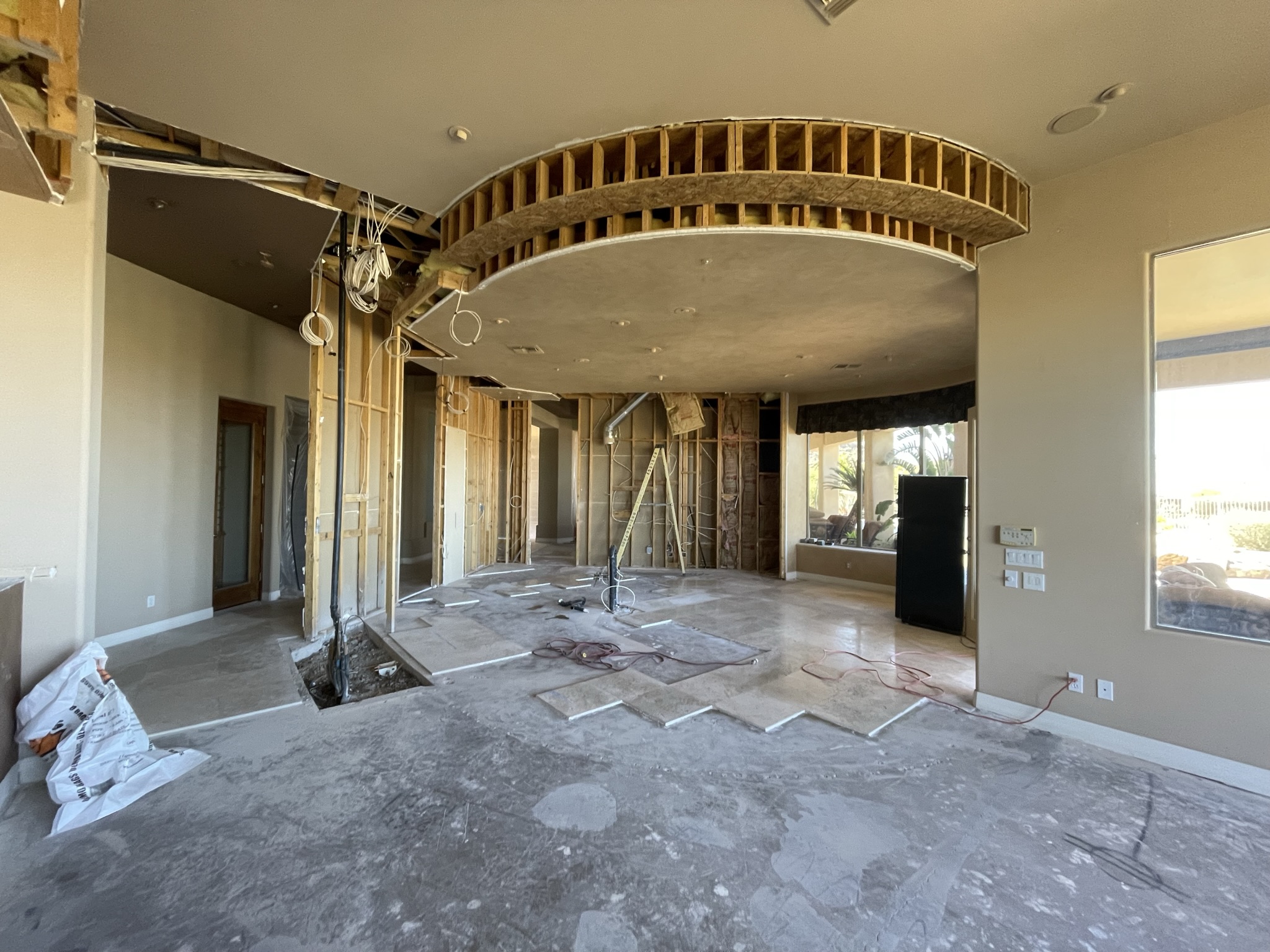 selective demolition in kitchen and living room area